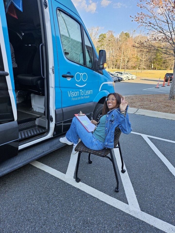 Mariam Sheriff prepares to check in Parkside students for free eye exams and glasses